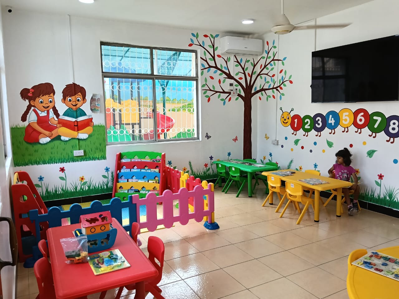 Colourful classroom with counting caterpillar wall