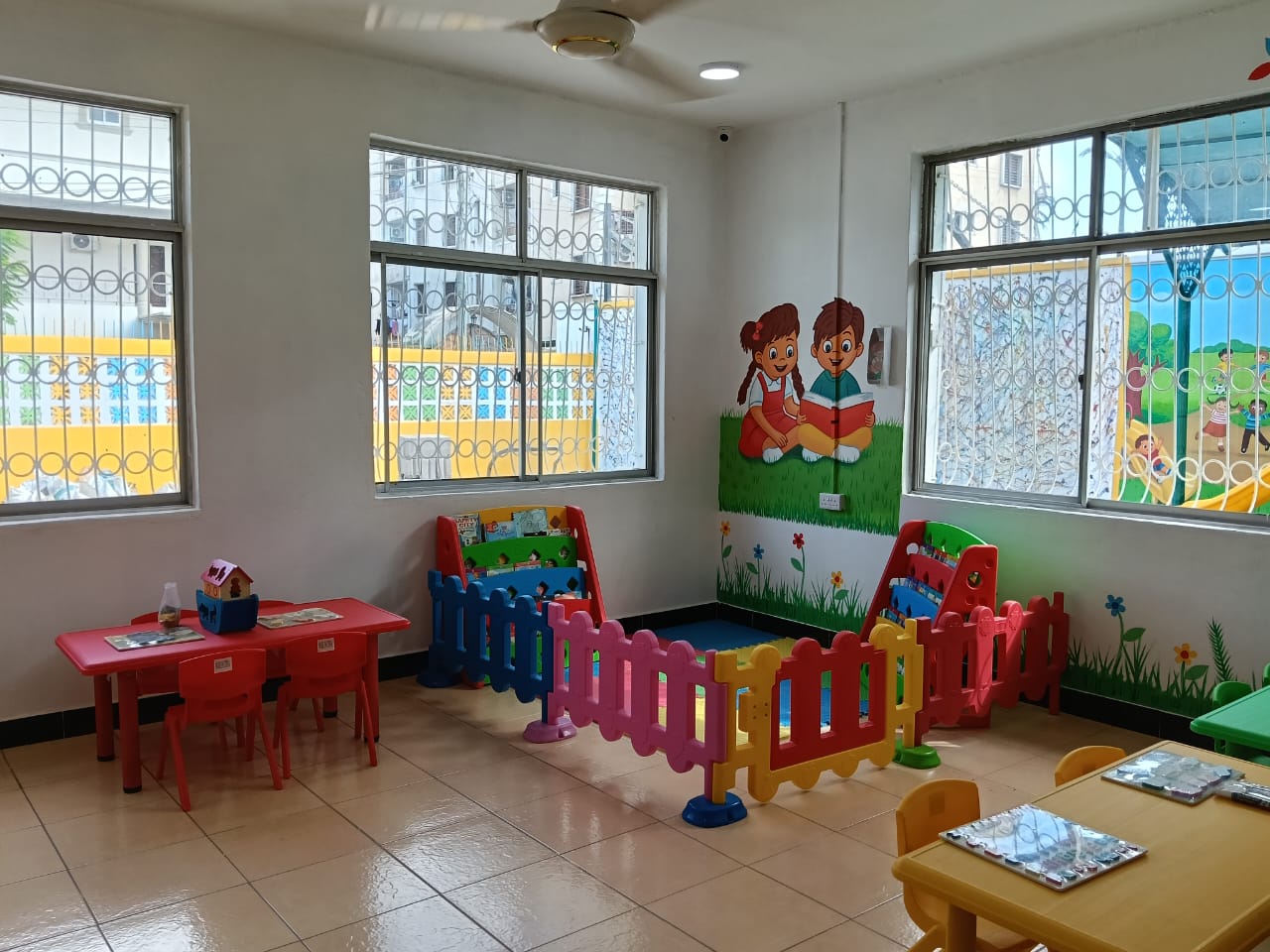Reading corner with book stands and play mats